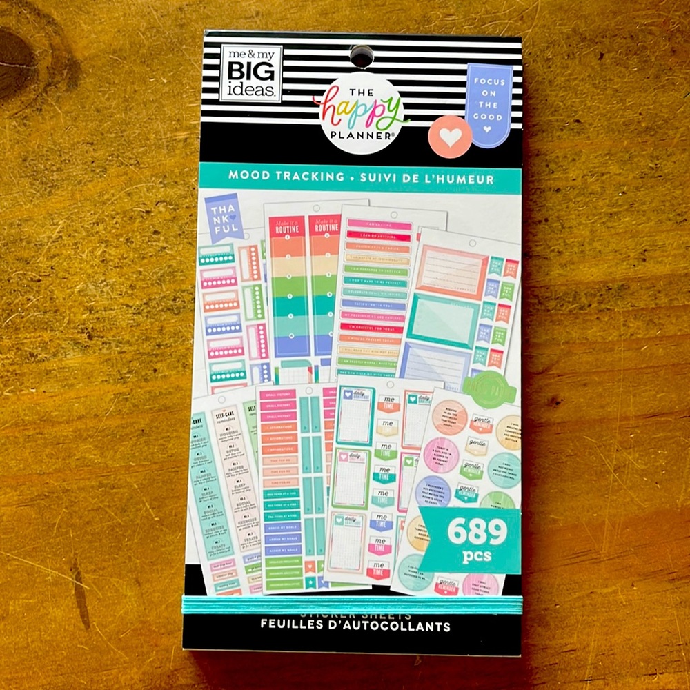 The happy planner mood tracker sticker book